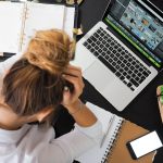 Deep work routine for tired brains – overwhelmed woman at laptop