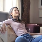 Calm your nervous system after work with a simple downshift routine on the couch